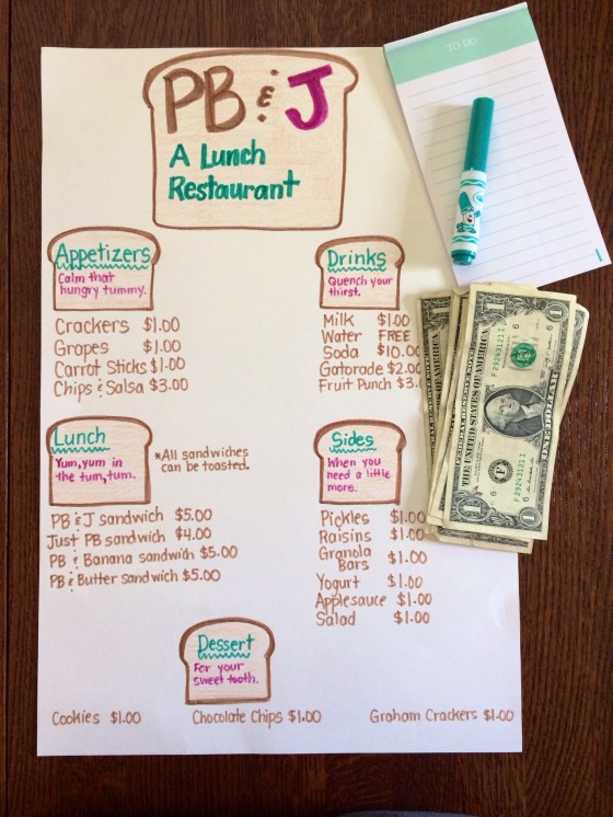 Our menu, cash and the ordering pad for the server.